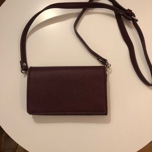 Deep plum wristlet with strap